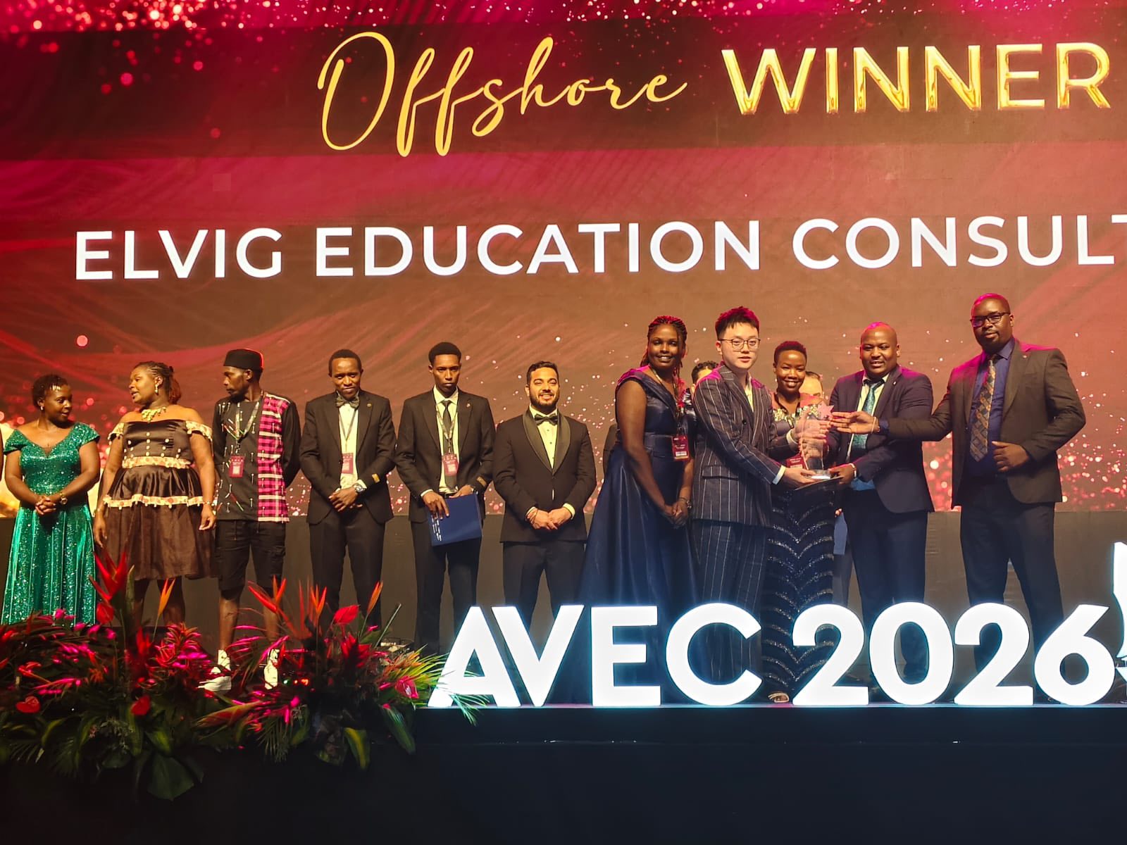 A closer view of the award presentation during the AVEC 2026 recognition moment.