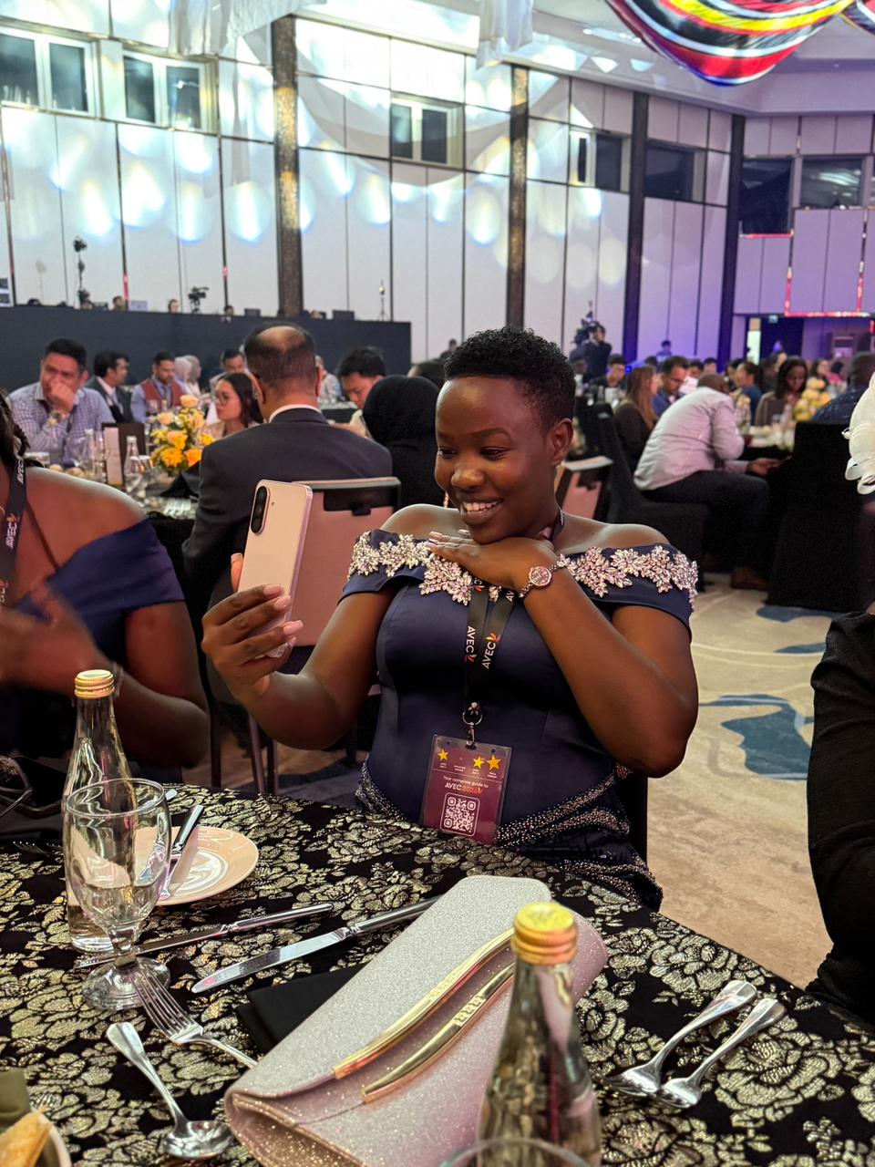 A cheerful table moment from the AVEC 2026 evening event.