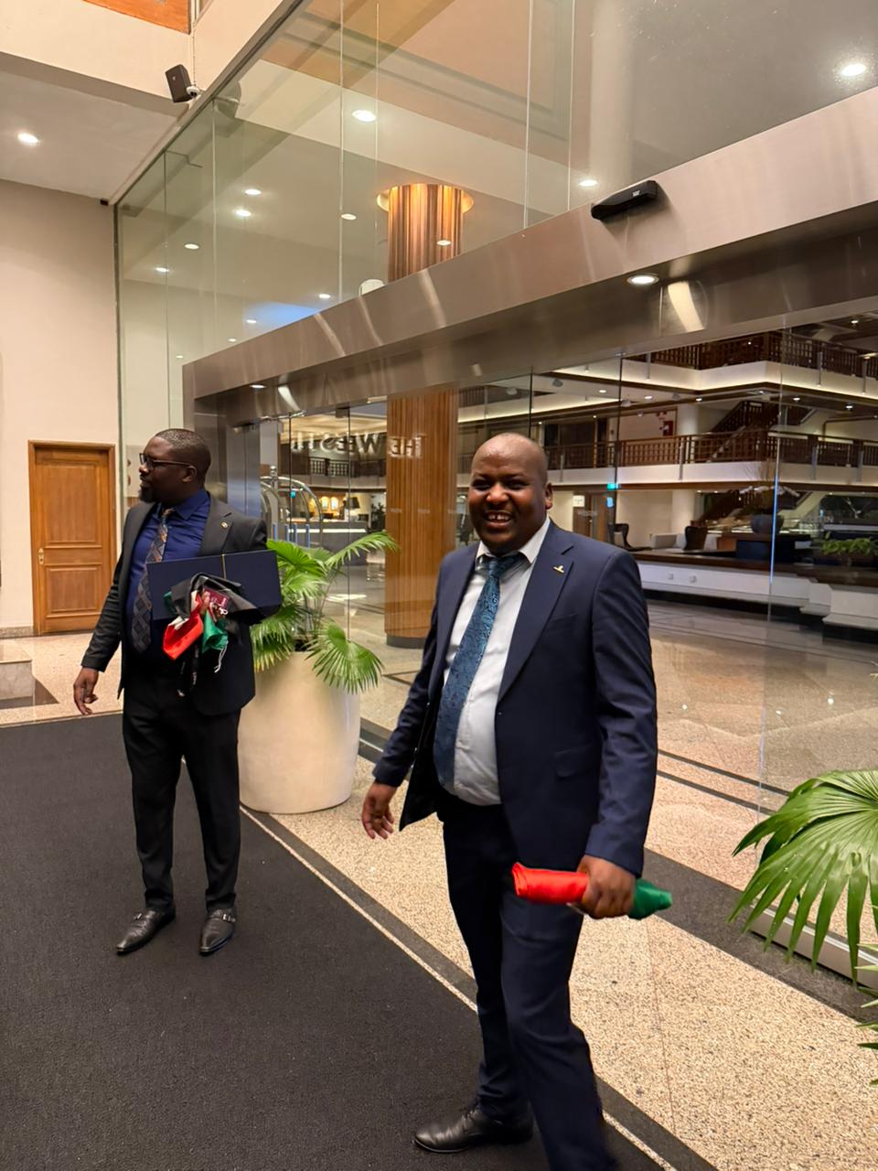 A lighter celebration moment in the hotel lobby following the AVEC 2026 activities.