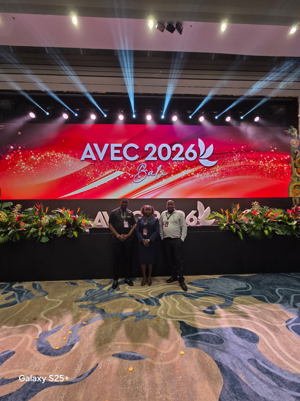 An AVEC 2026 stage moment with the Elvig team in Bali after the event proceedings.